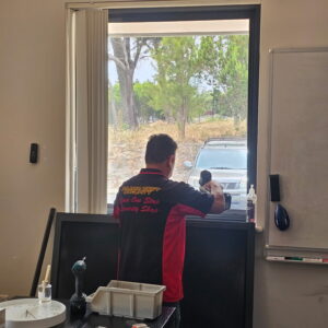 Window flyscreen installation inside classroom at Wellard school